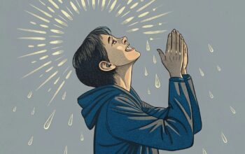 a-person-lifting-clasped-hands-toward-heaven-min