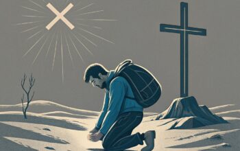 a-man-kneels-in-the-middle-of-a-gray-desert-min